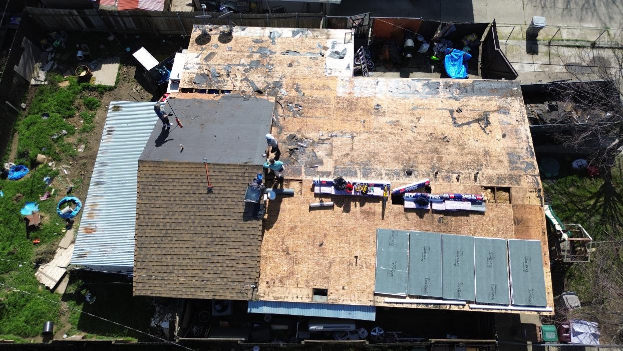 Spring Roofing Inc. Logo