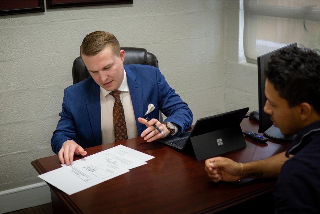 Nick Wright Defense Lawyer at Work on a defense case in Norfolk Office