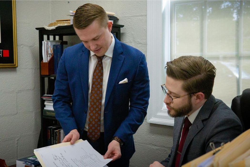 Nick and Calum Welch Reviewing a dui case file