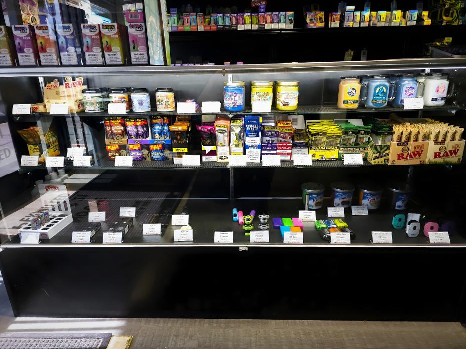 Product - Smoke shop essentials like Cartridge batteries, RAW rolling papers, and more.
