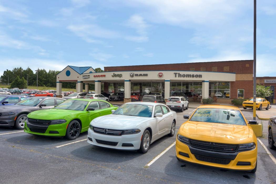 Thomson Chrysler Dodge Jeep RAM FIAT Logo