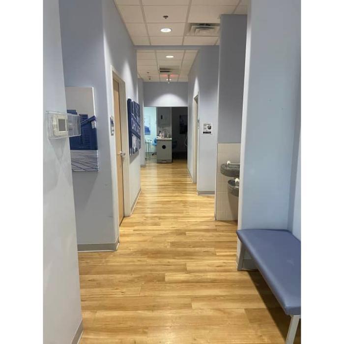 DentalWorks &amp; Orthodontics Forest Park Logo