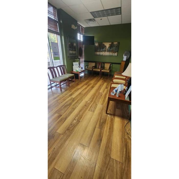 Village Elm Dental Care &amp; Orthodontics Logo