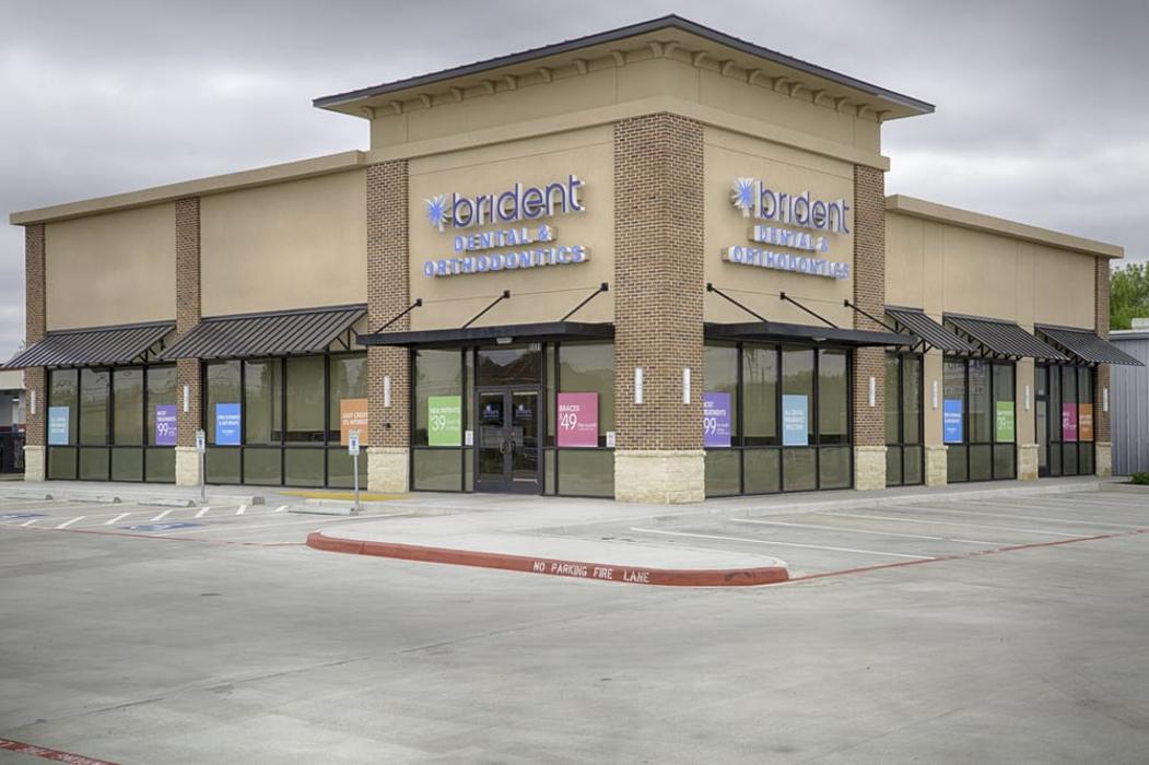 Brident Dental &amp; Orthodontics Logo