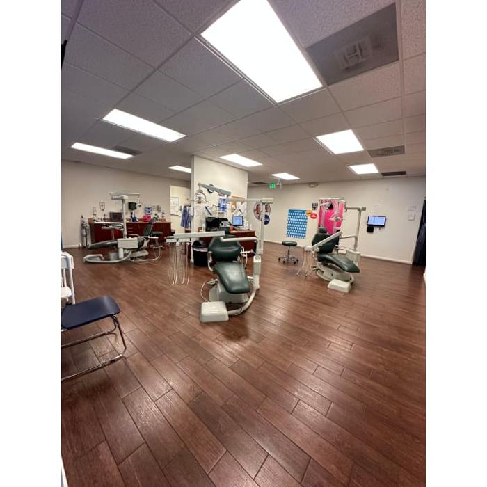 Western Dental &amp; Orthodontics Kids Logo