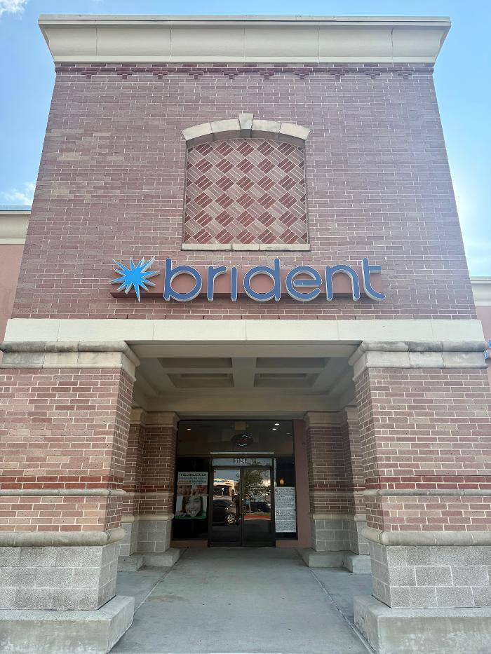 Brident Dental &amp; Orthodontics Logo