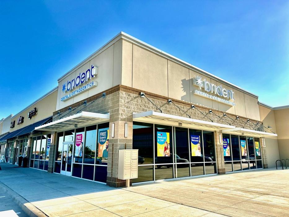 Brident Dental &amp; Orthodontics Logo