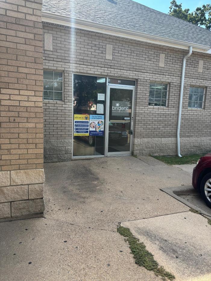 Brident Dental &amp; Orthodontics Logo