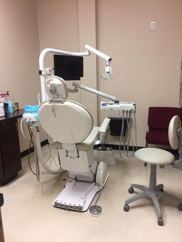 Brident Dental &amp; Orthodontics Logo