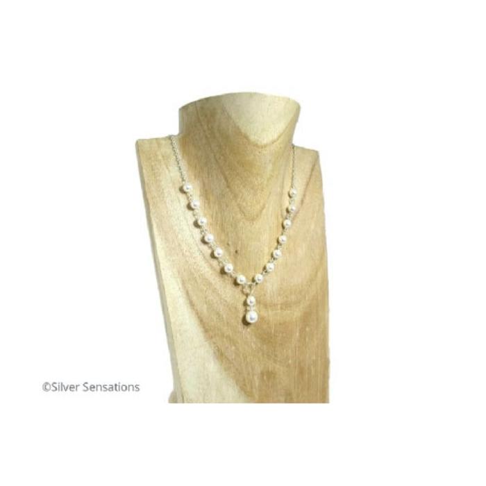 Elegant pearl necklace with white Swarovski Pearls & .925 Sterling Silver. Versatile enough to wear with a Wedding or prom outfit & then with your favourite pair of jeans.