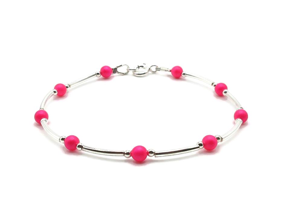 handmade sterling silver bangle style bracelet with neon pink pearls