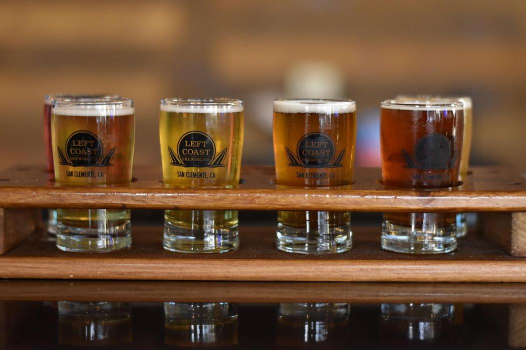 Left Coast Brewing Distillery Smokehouse - Ontario Logo