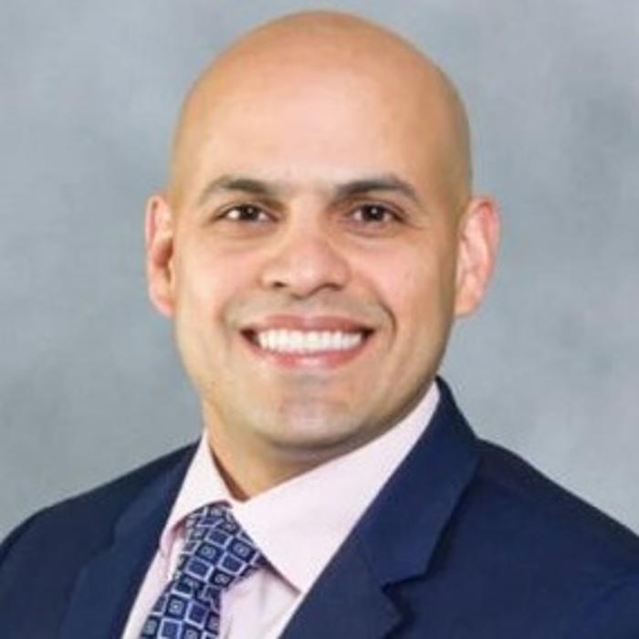 Ricardo Arevalo, M.D. Logo