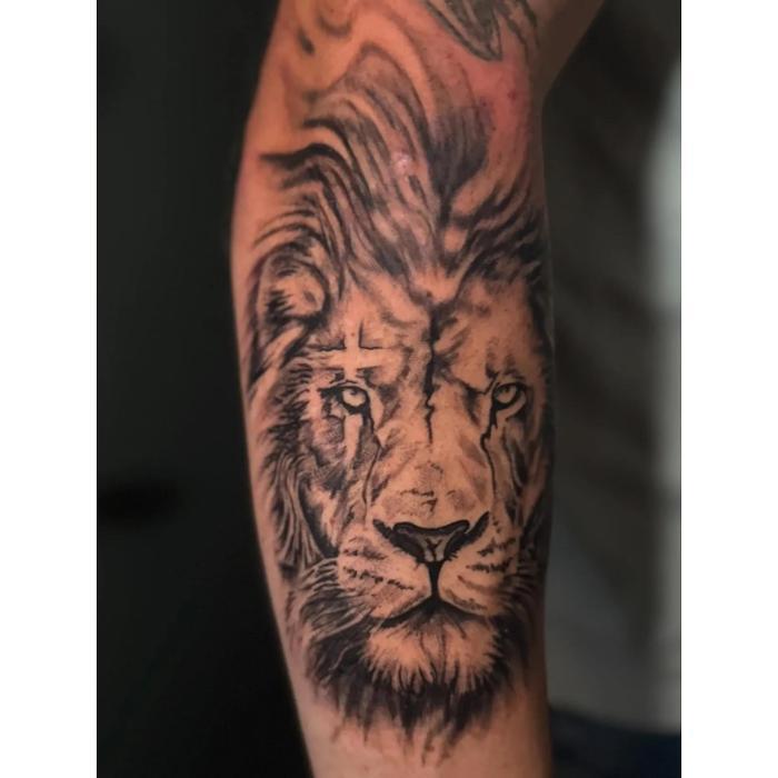 Lion Arm Tattoo