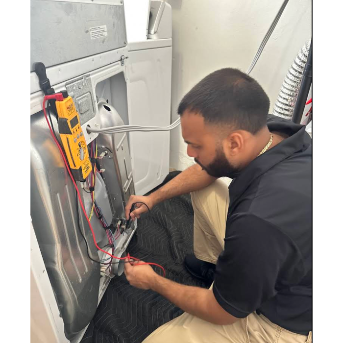Amyan Appliance Service LLC technician performing a Dryer repair in Seminole, FL. Our licensed experts handle appliance diagnostics and repairs with precision, keeping your home running smoothly.