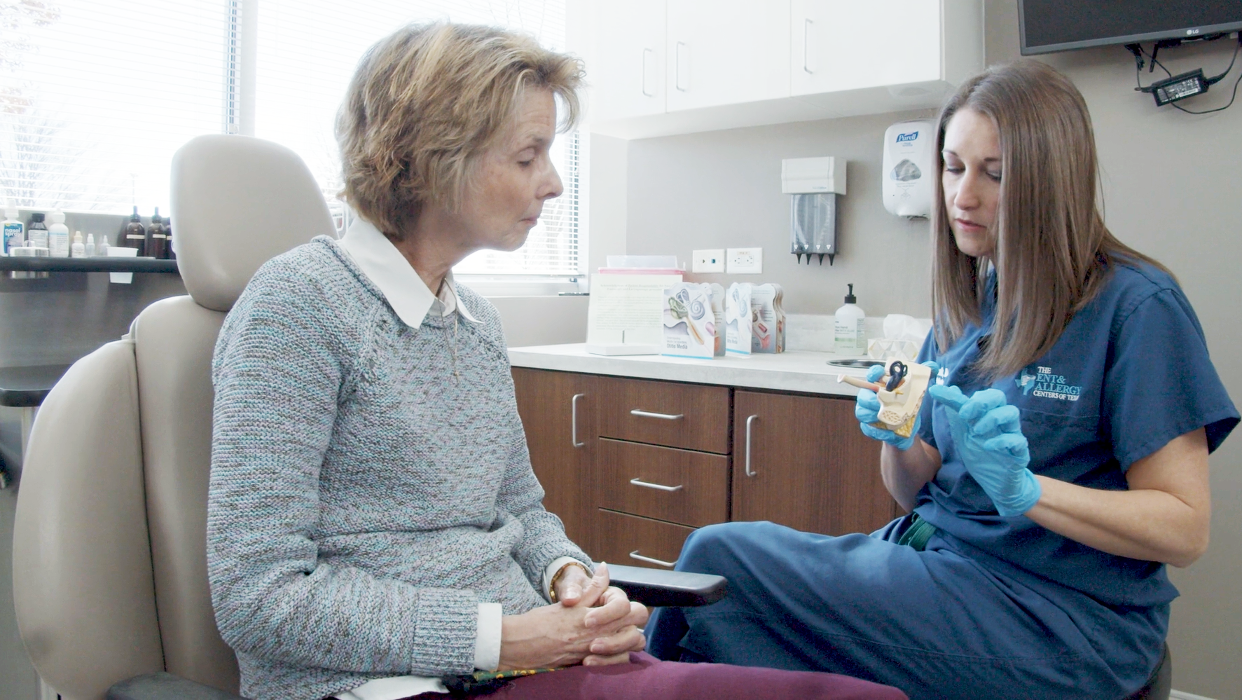 Cherie L. Booth, MD, with a patient