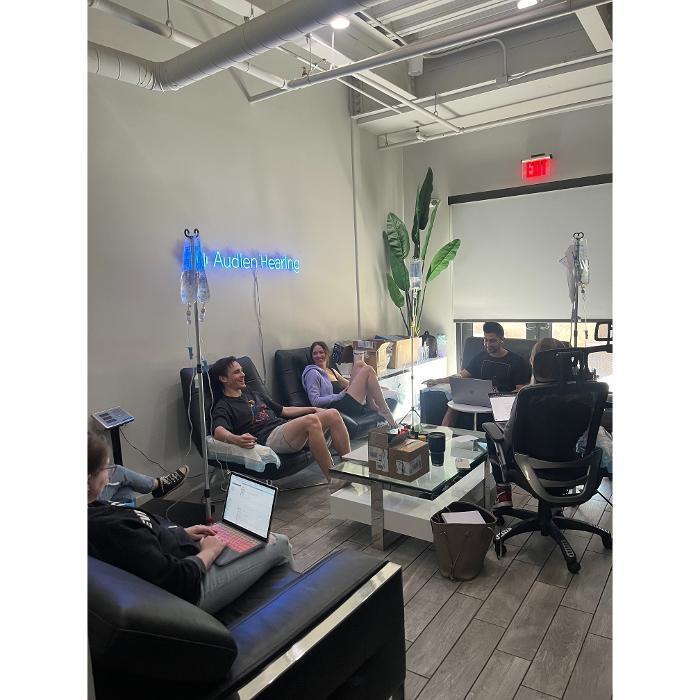 Group IV therapy session for corporate event. Same-day mobile service brings professional RN-administered treatments to your venue.