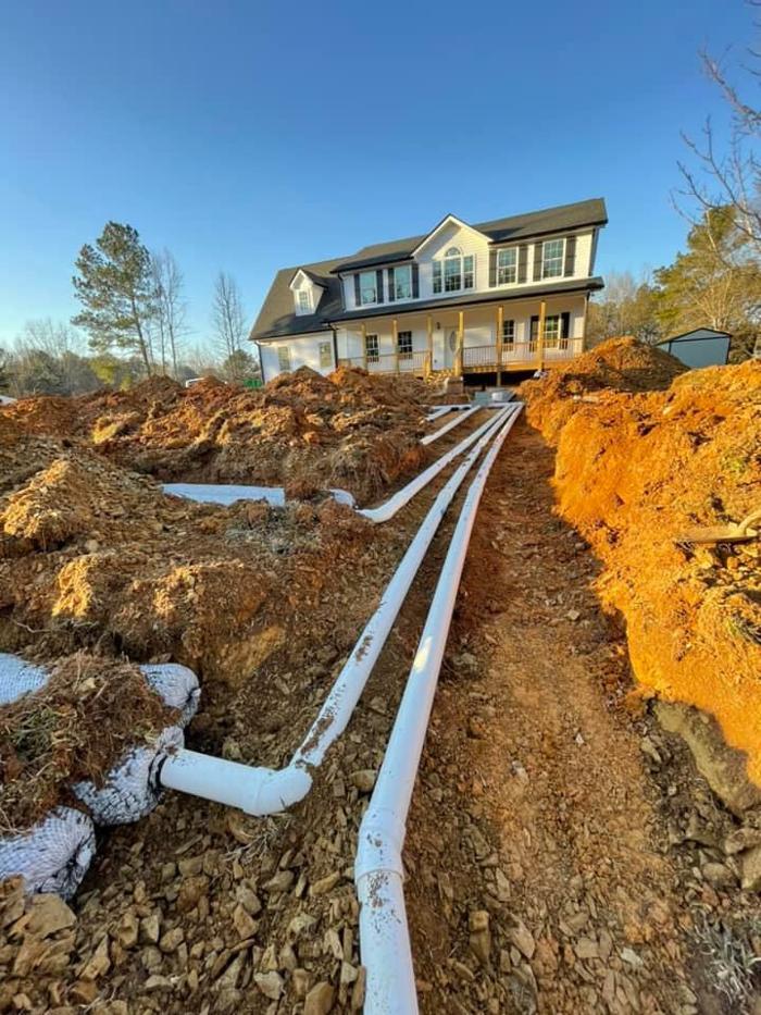 Hughes Septic Services Logo