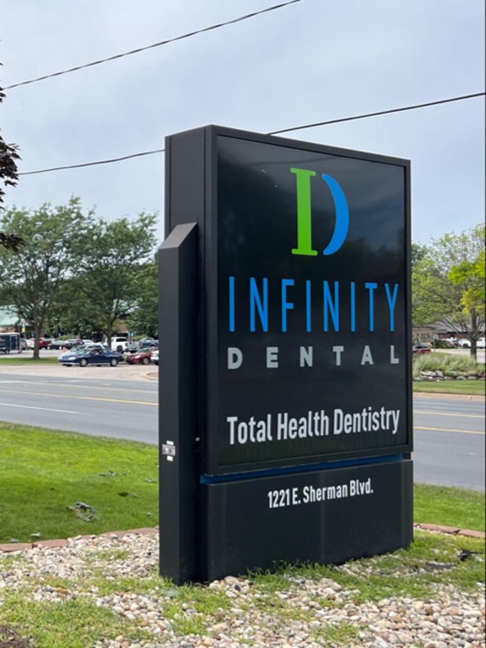 Infinity Dental Norton Shores Logo