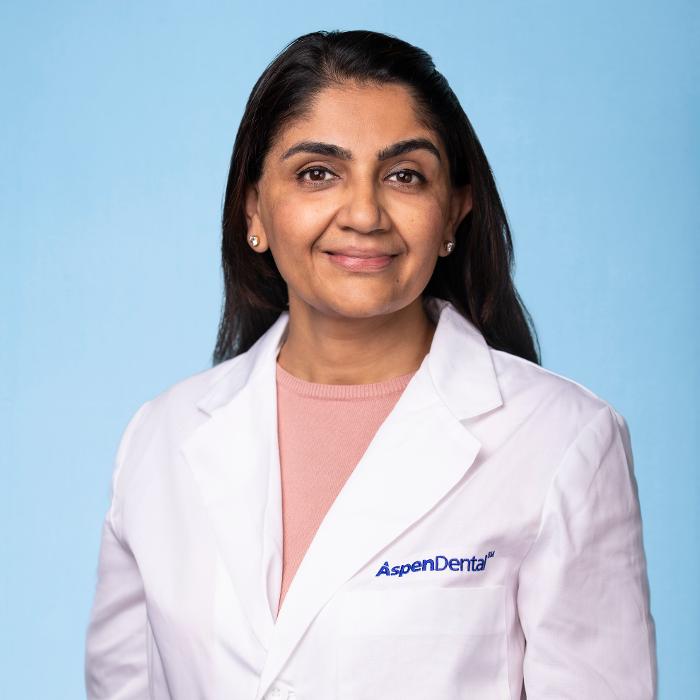 Kavita Sharma, DDS, DMD Logo