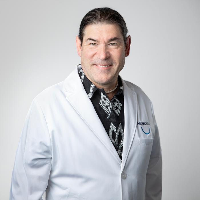 Ronald Moore, DDS, DMD Logo