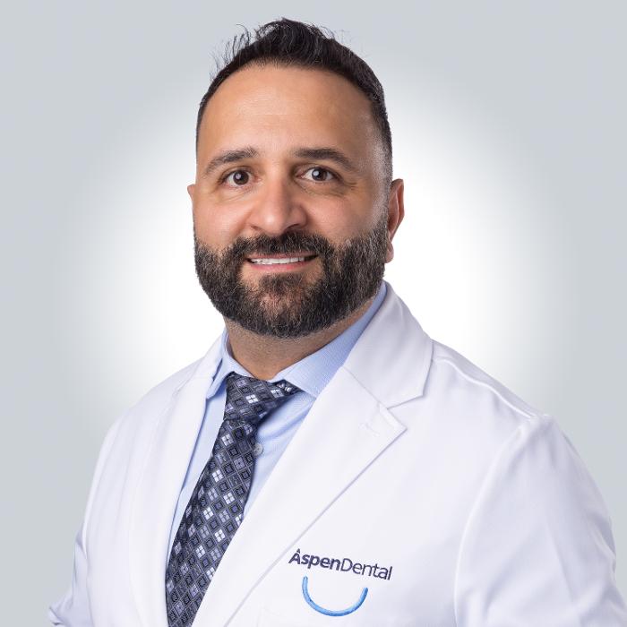 Hamed Mahmoudi, DDS, DMD Logo