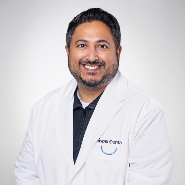 Amandeep Arneja, DDS, DMD Logo