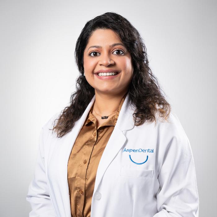 Chaitali Minama, DDS, DMD Logo