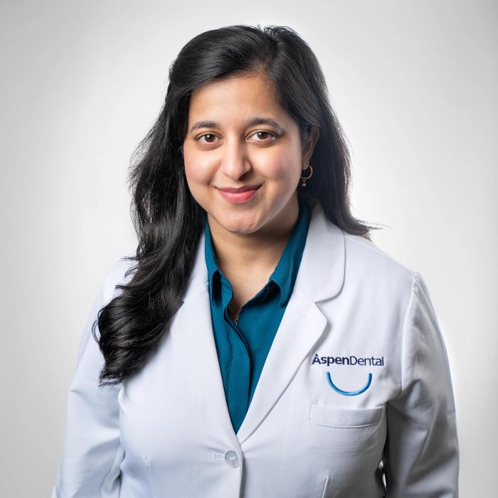 Jhansi Tulasi, DDS, DMD Logo