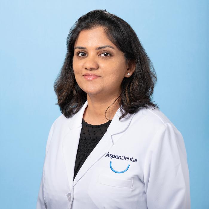 Reena Guttha, DDS, DMD Logo