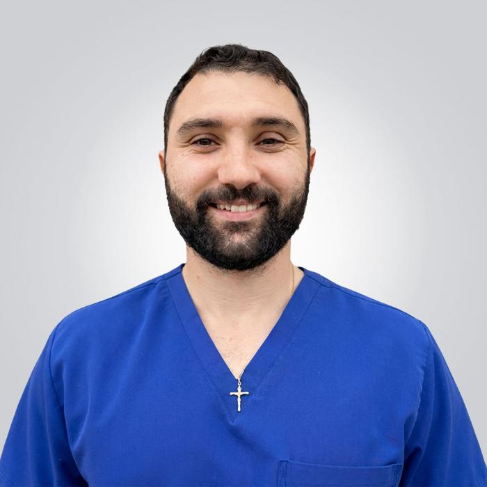 Reynaldo Pella, DDS, DMD Logo