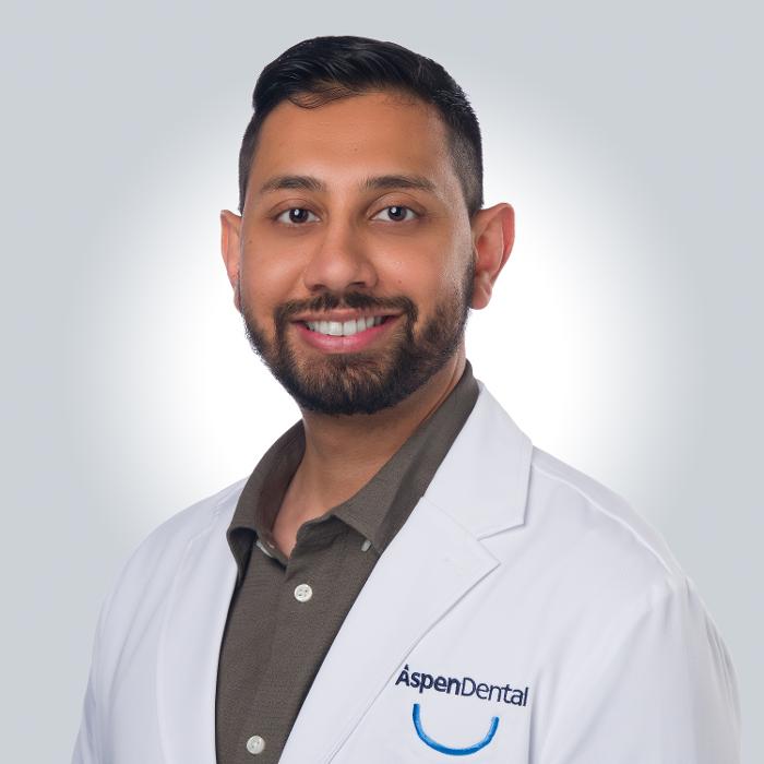 Maninder Singh, DDS, DMD Logo