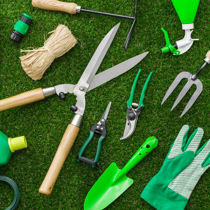Selection of professional gardening tools, representing the equipment used for lawn care, trimming and general maintenance.&rdquo;