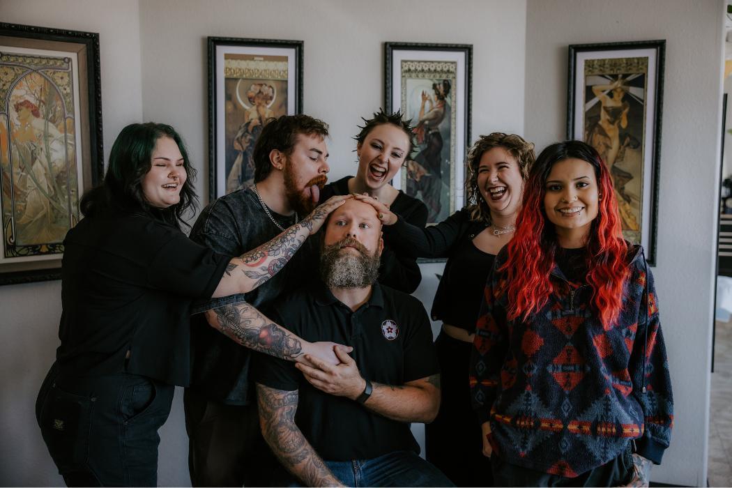 The Red Arbor Tattoo team at our studio in Tea, South Dakota. Female and male tattoo artists ready to bring your ideas to life.