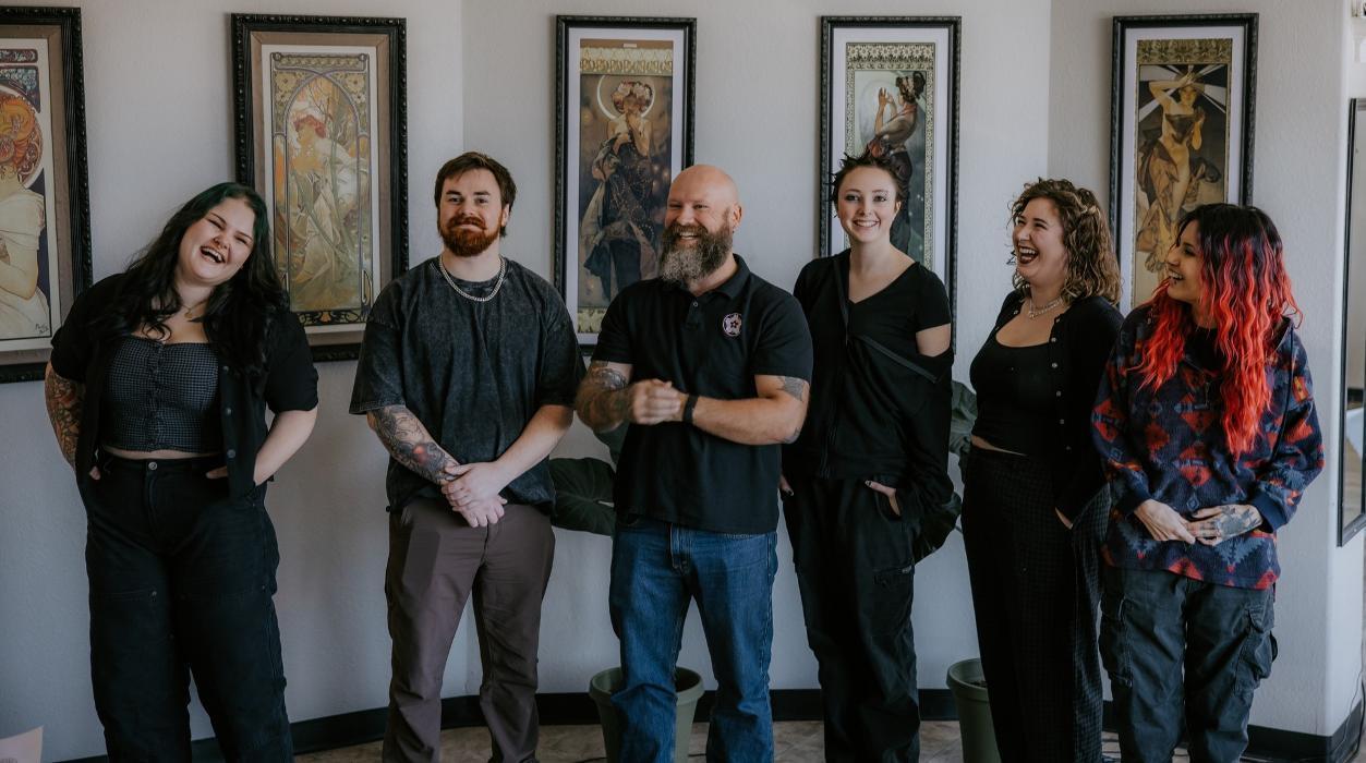 The Red Arbor Tattoo team at our studio in Tea, South Dakota. Female and male tattoo artists ready to bring your ideas to life.
