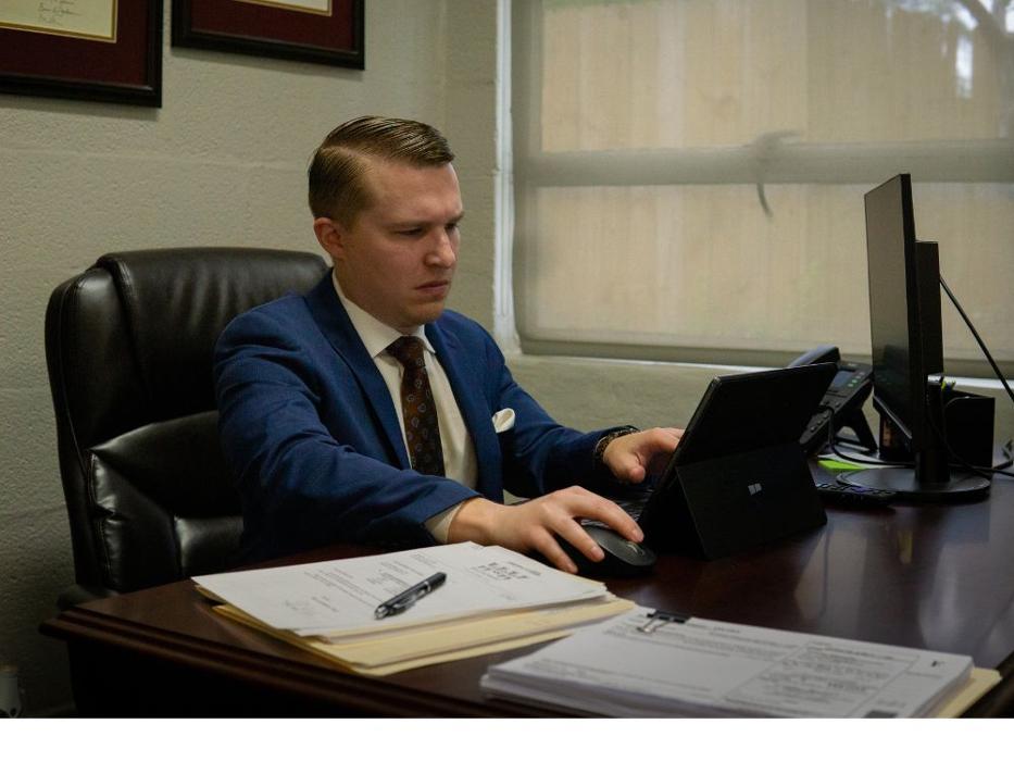 Nick Wright Trusted Criminal Defense lawyer reviewing an ongoing case