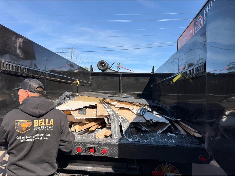 Joe loading construction debris for a contractor job in Cottonwood, AZ.