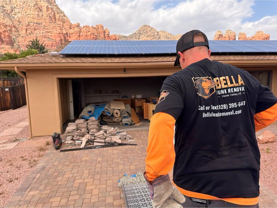 Robert walking toward a house with beautiful Sedona landscape.