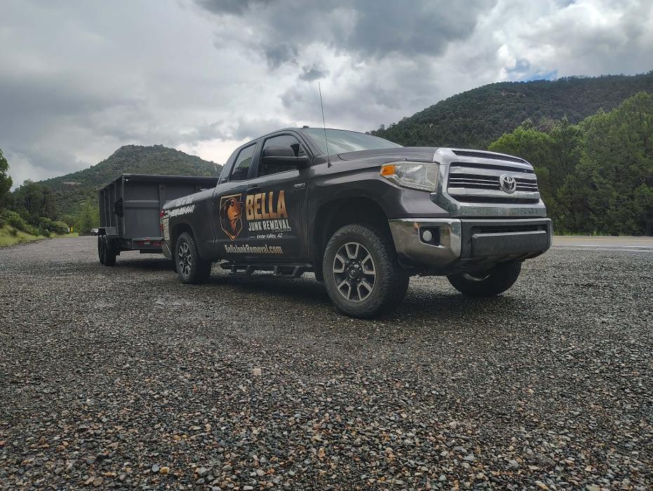 The Bella Junk Removal Toyota Tundra and trailer in Jerome, AZ.