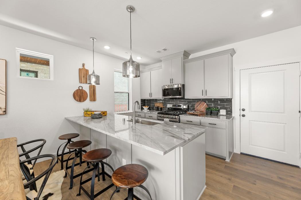 Grenadier Homes - Ten Mile Creek Townhomes Image