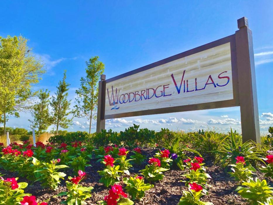 Grenadier Homes - Woodbridge Villas Logo