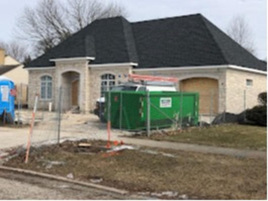 New construction dumpster rental in Orland Park, IL
WasteBox Inc roll off dumpster on site for a new home build cleanup and construction debris removal.