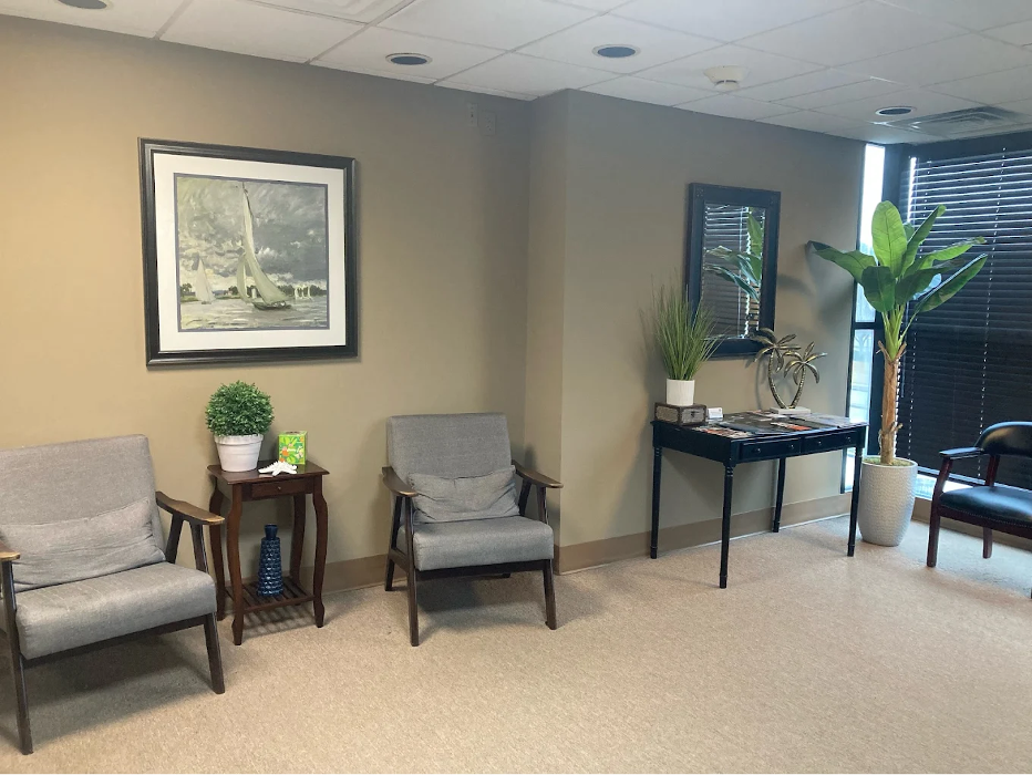 Welcoming reception area at Men's Wellness Centers Virginia Beach, where patients check in for physician-supervised testosterone therapy, hormone optimization, and wellness appointments.
