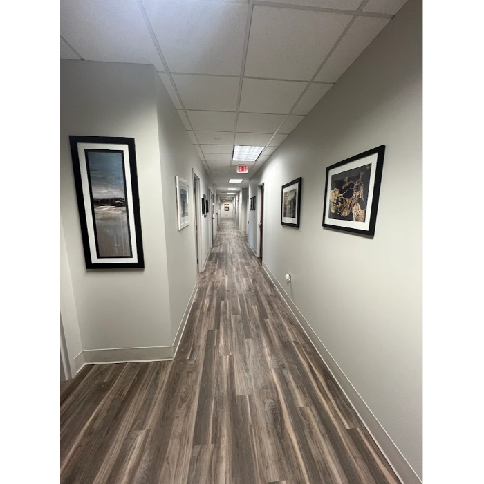 Welcoming reception area at Men's Wellness Centers Virginia Beach, where patients check in for physician-supervised testosterone therapy, hormone optimization, and wellness appointments.
