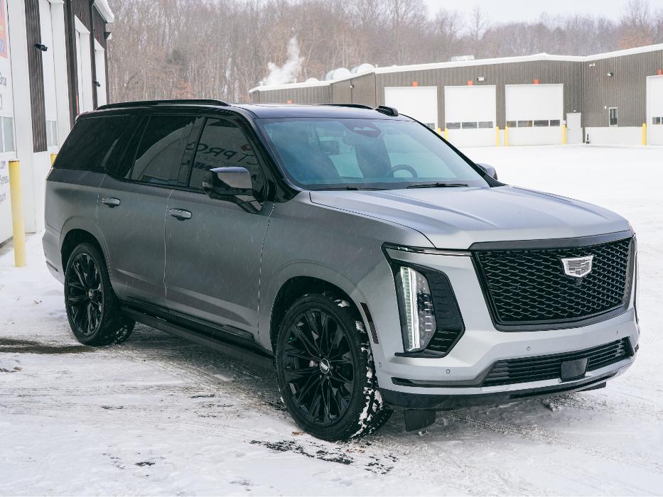 Full Vehicle Matte PPF Wrap with Gloss Black Paint Protection Film Tuxedo wrap. OEM emblem replacement, and Llumar Formula One Stratos Window tint.