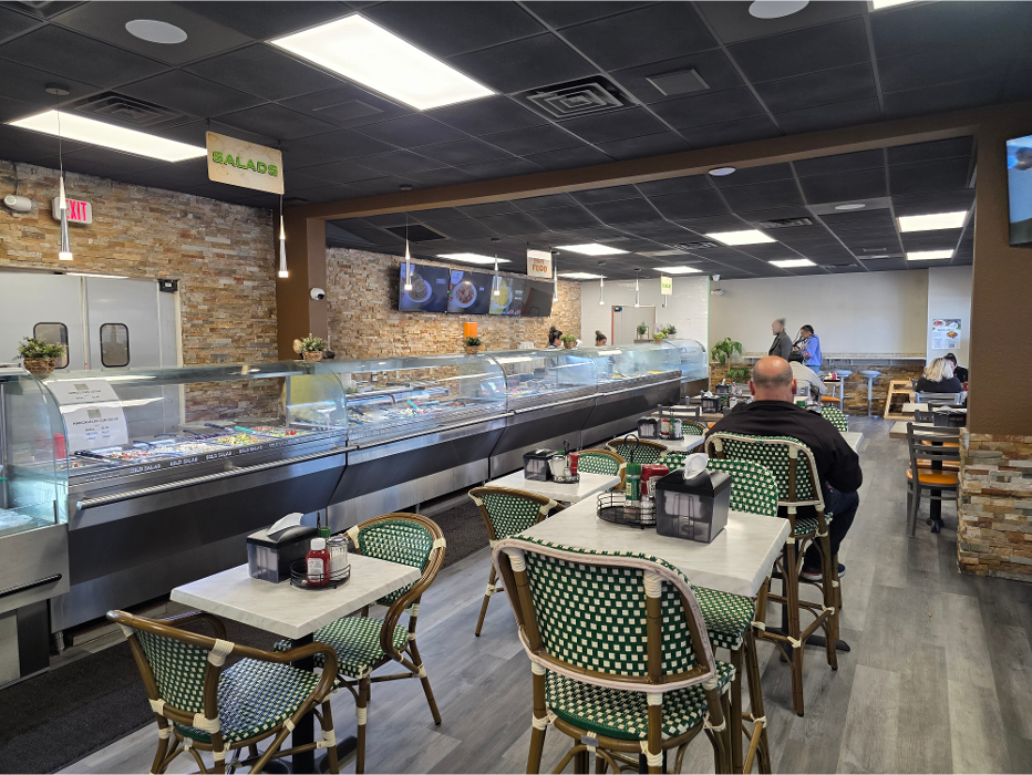 Dining area and Dominican buffet at Riverview Fresh Cuisine restaurant in Tampa Florida.