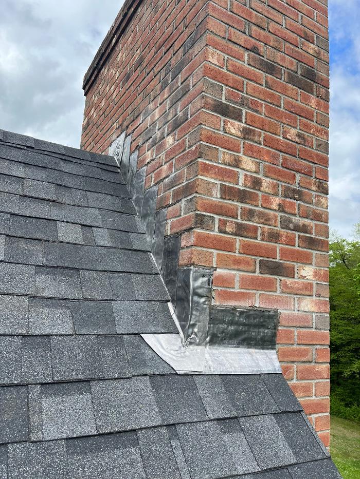 Three Mountain Roofing Image