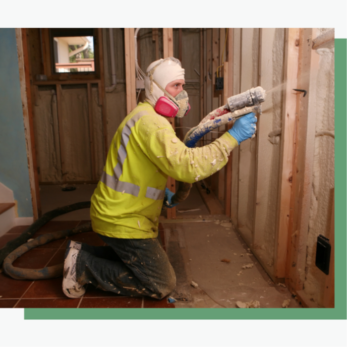 An expert contractor from Driftless Foam (or similar) is performing blown-in foam insulation in a home's attic, delivering closed-cell or open-cell foam for long-lasting energy savings.