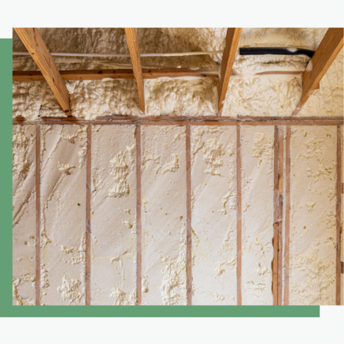 Finished spray foam insulation in an attic: thick, seamless layer of expanding foam fully covering rafters, roof deck, and wall cavities, creating a continuous airtight thermal and air barrier for maximum energy efficiency.