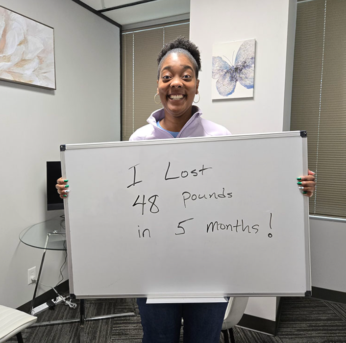 Happy client down 48 pounds